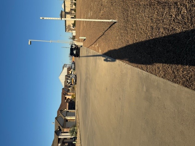 101 Calvin Smith Ln., Unit B Jarrell, TX 76537 - Photo 32 of 33 View down the street in front of duplex. Conveniently located with great access to I-H 35 and local businesses!