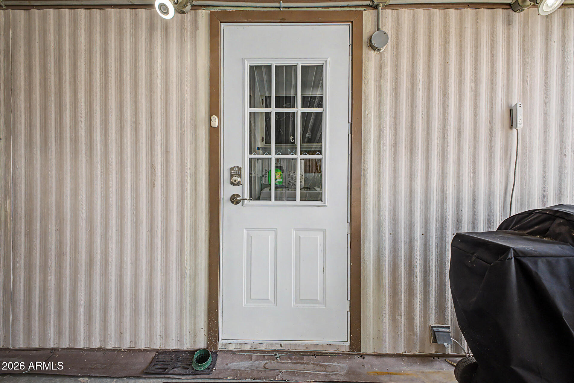 303 South Recker Road, Unit 3 Mesa, AZ 85206 - Photo 34 of 38 Carport Door