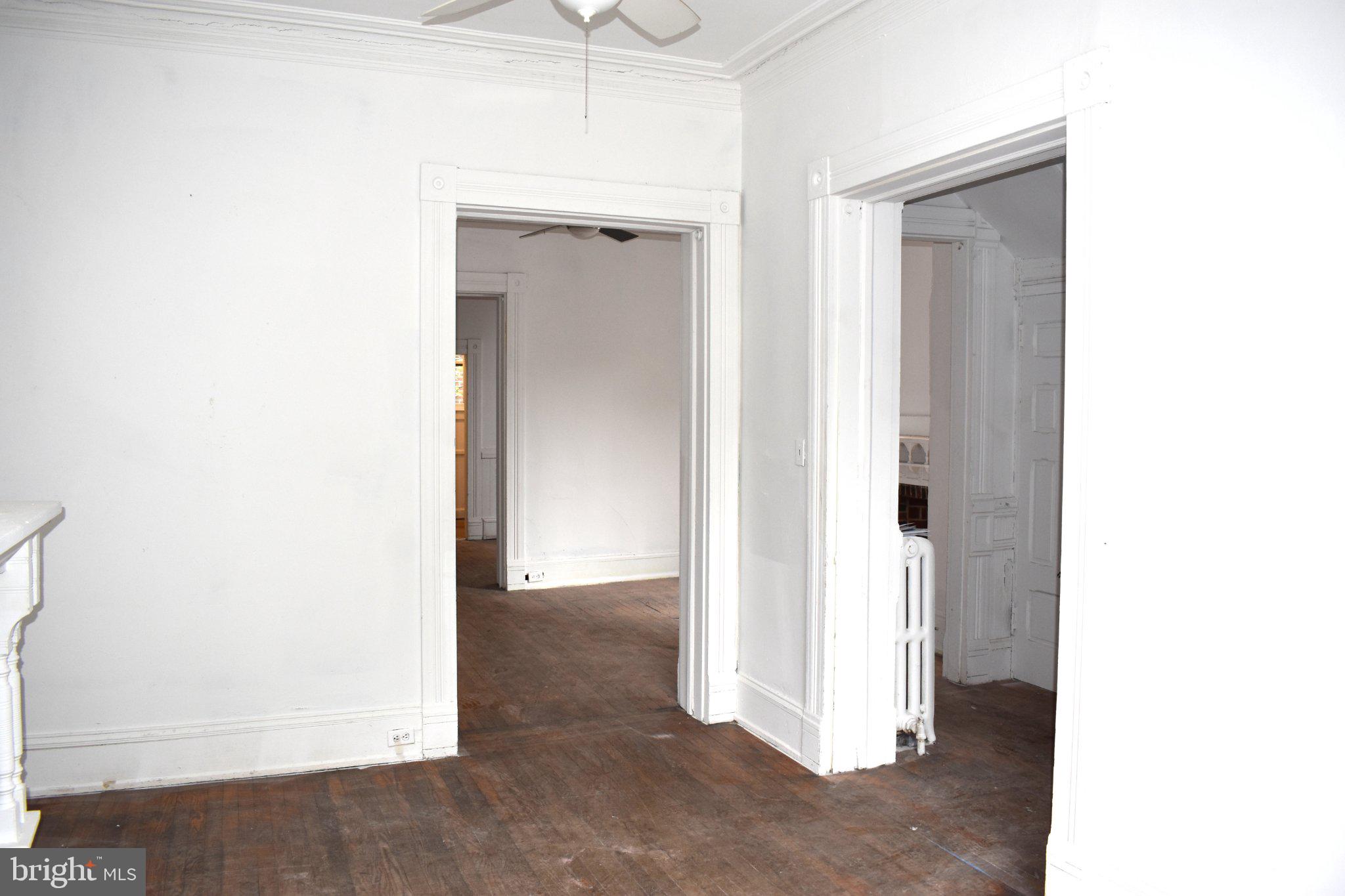1605 15th Street Northwest Washington, DC 20009 - Photo 4 of 16 Spacious entryway with classic charm.