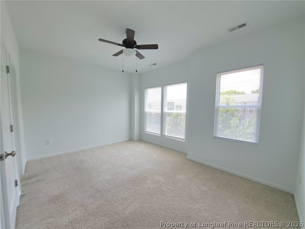 1939 Robin Hill Lane Raleigh, NC 27610 - Photo 17 of 25 a view of an empty room with a window