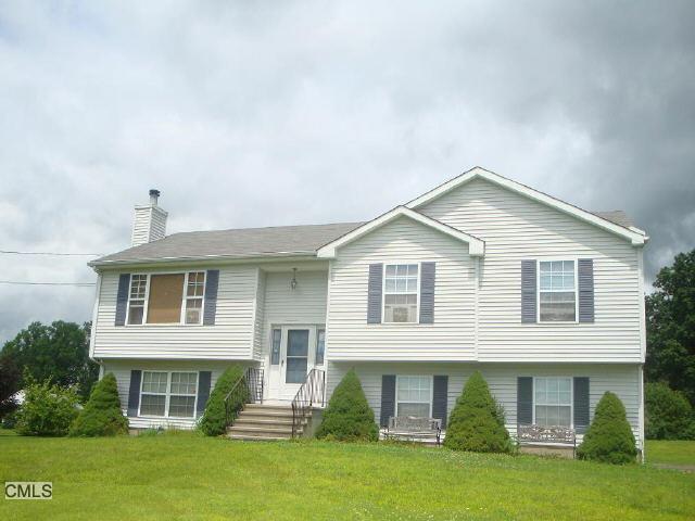 17 Canfield Road Seymour, CT 06483 - Photo 1 of 1 a front view of a house with a yard