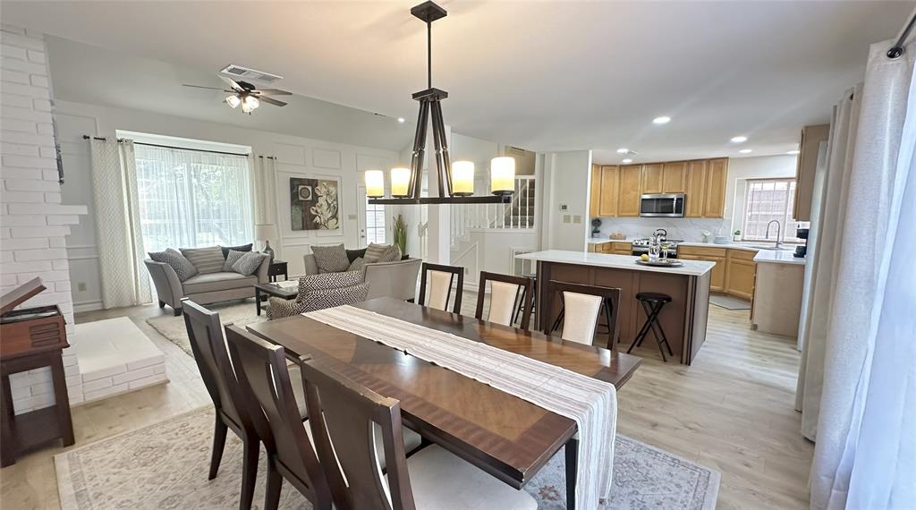 3411 Beech Street Rowlett, TX 75089 - Photo 12 of 32 a view of a dining room with furniture