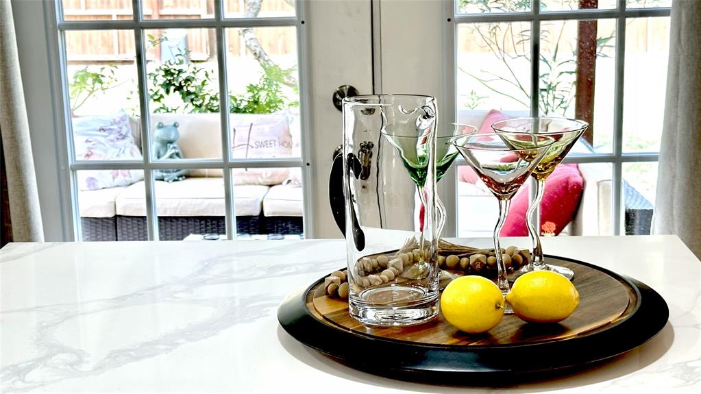 3411 Beech Street Rowlett, TX 75089 - Photo 10 of 32 a view of a swimming pool with a dining table and chairs
