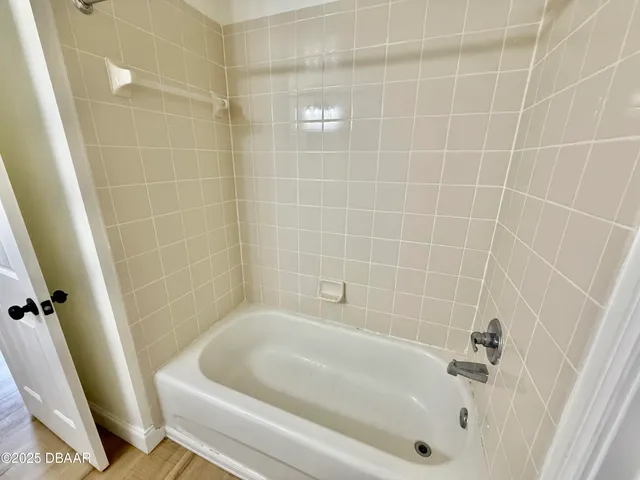 a bathroom with a bathtub