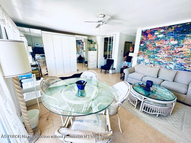 44 Cocoanut Row, Unit 509B Palm Beach, FL 33480 - Photo 3 of 7 a living room with furniture and a table
