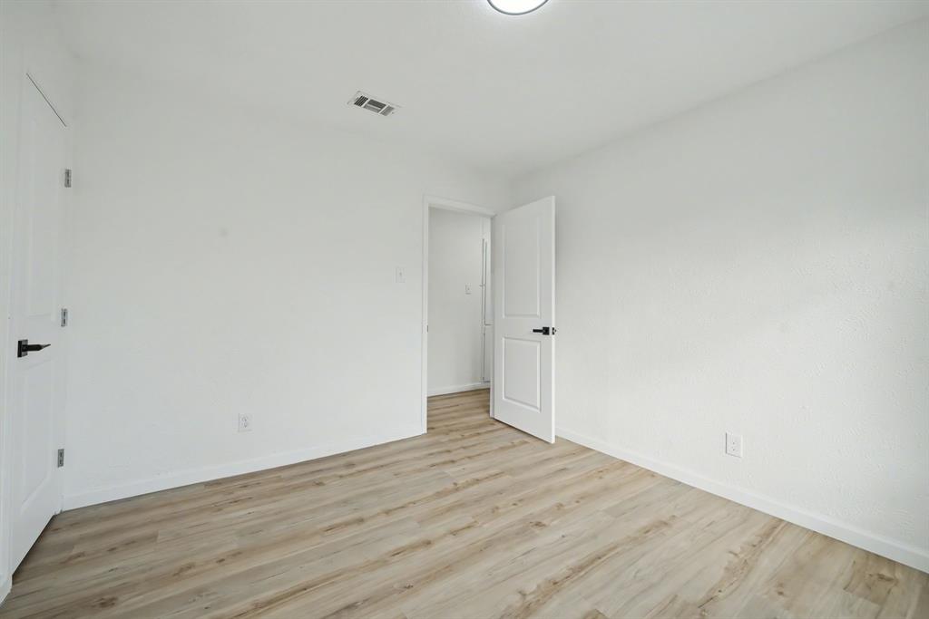 11446 Lippitt Avenue Dallas, TX 75218 - Photo 18 of 26 a view of an empty room