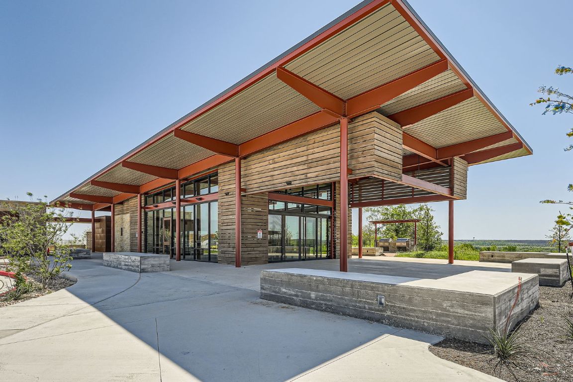 11400 American Mustang Loop Manor, TX 78653 - Photo 22 of 24 a view of a house with a patio