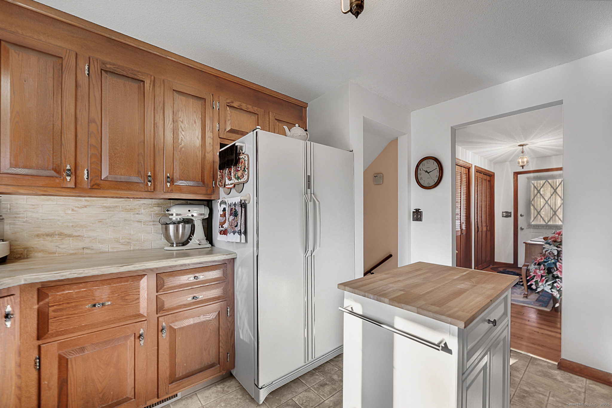 52 Wood Creek Road Burlington, CT 06013 - Photo 15 of 40 a kitchen with cabinets and stainless steel appliances