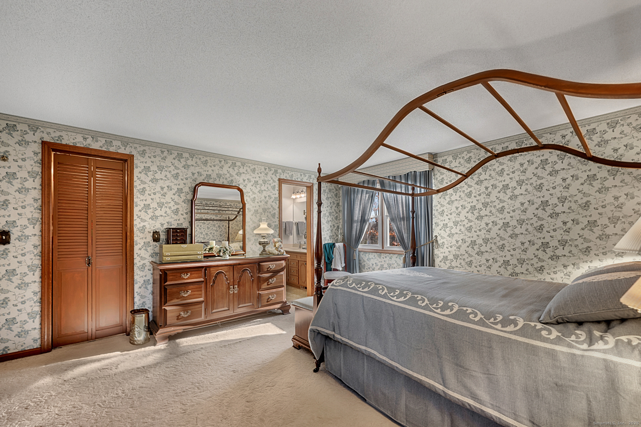 52 Wood Creek Road Burlington, CT 06013 - Photo 18 of 40 a bedroom with a bed and a dresser