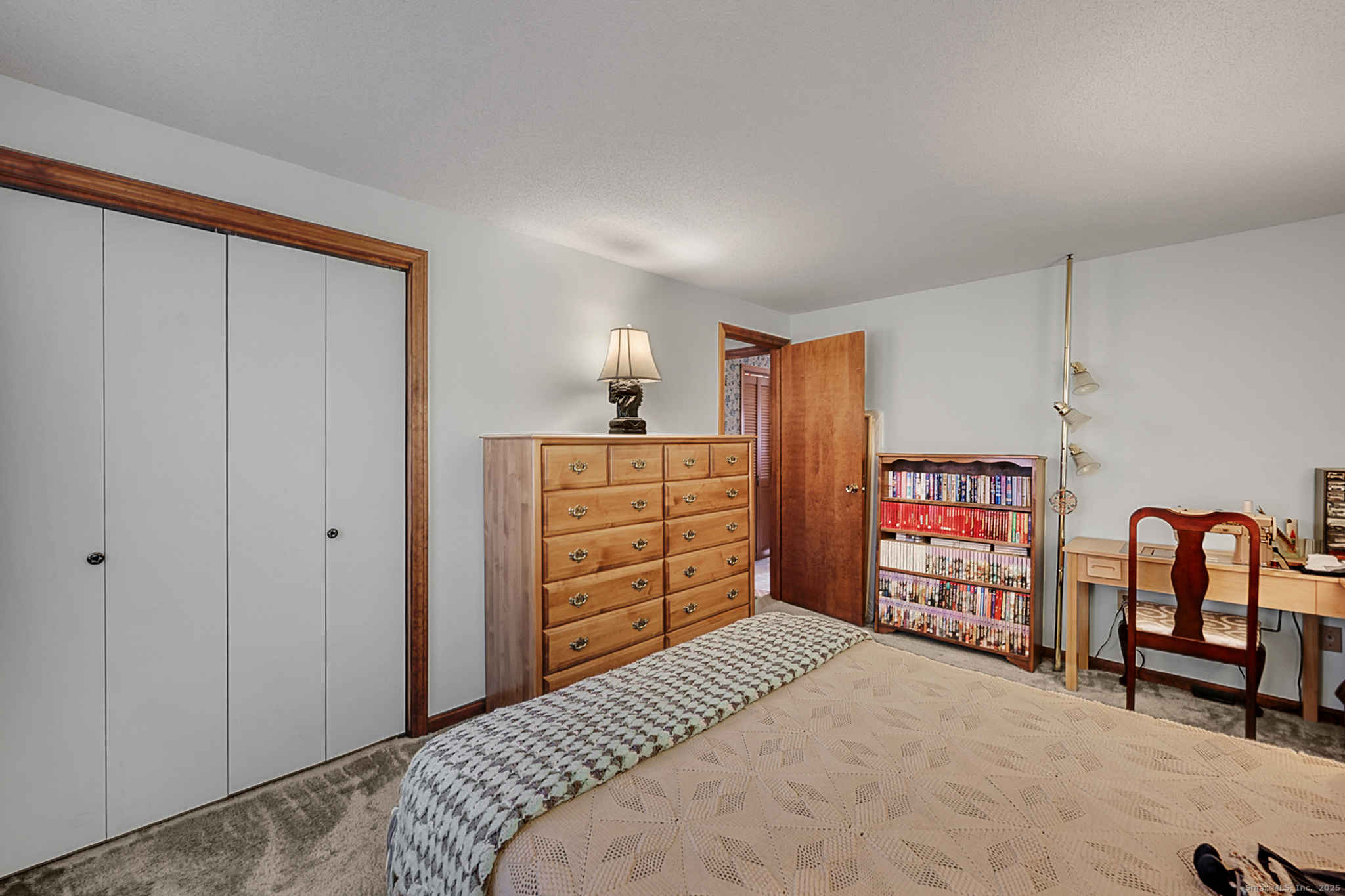 52 Wood Creek Road Burlington, CT 06013 - Photo 24 of 40 a bedroom with a bed and a cabinets