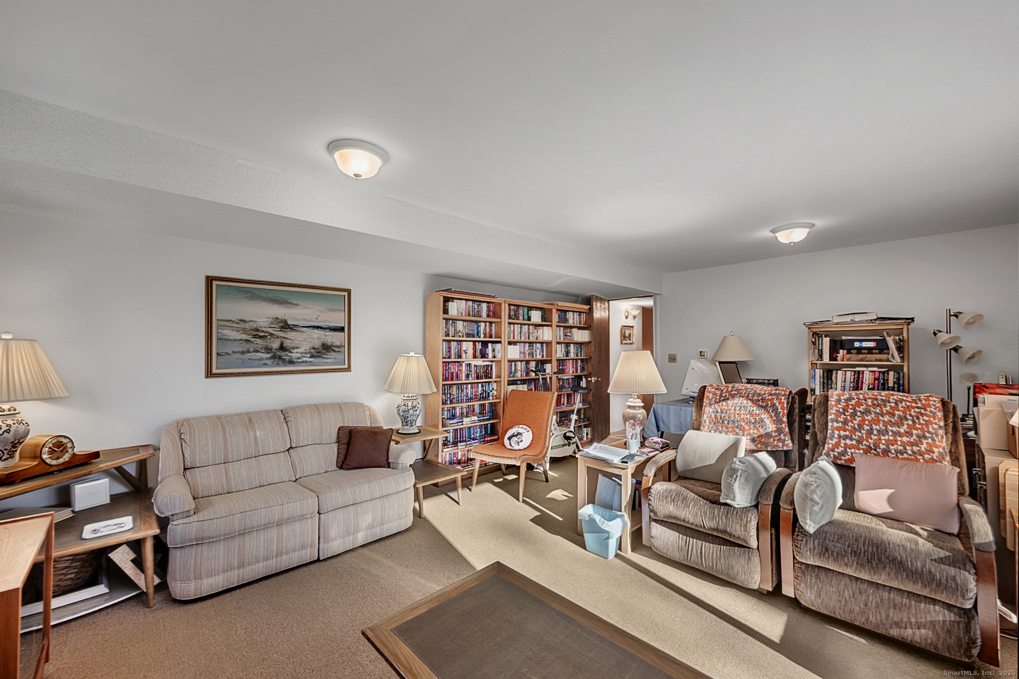 52 Wood Creek Road Burlington, CT 06013 - Photo 29 of 40 a living room with furniture and a large window