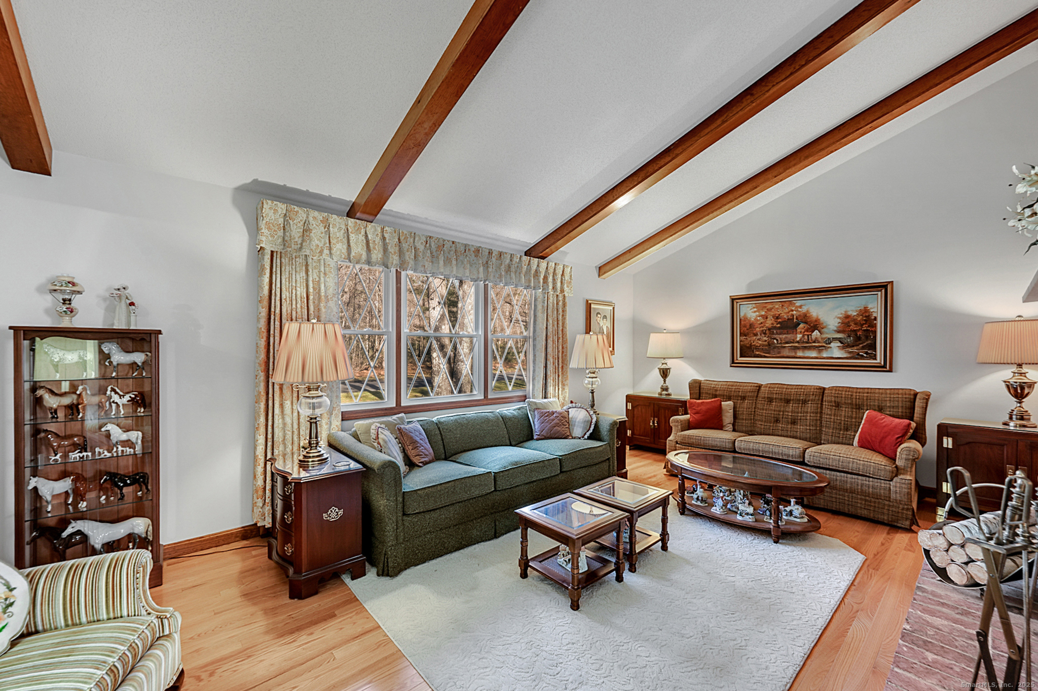 52 Wood Creek Road Burlington, CT 06013 - Photo 9 of 40 a living room with furniture and a large window