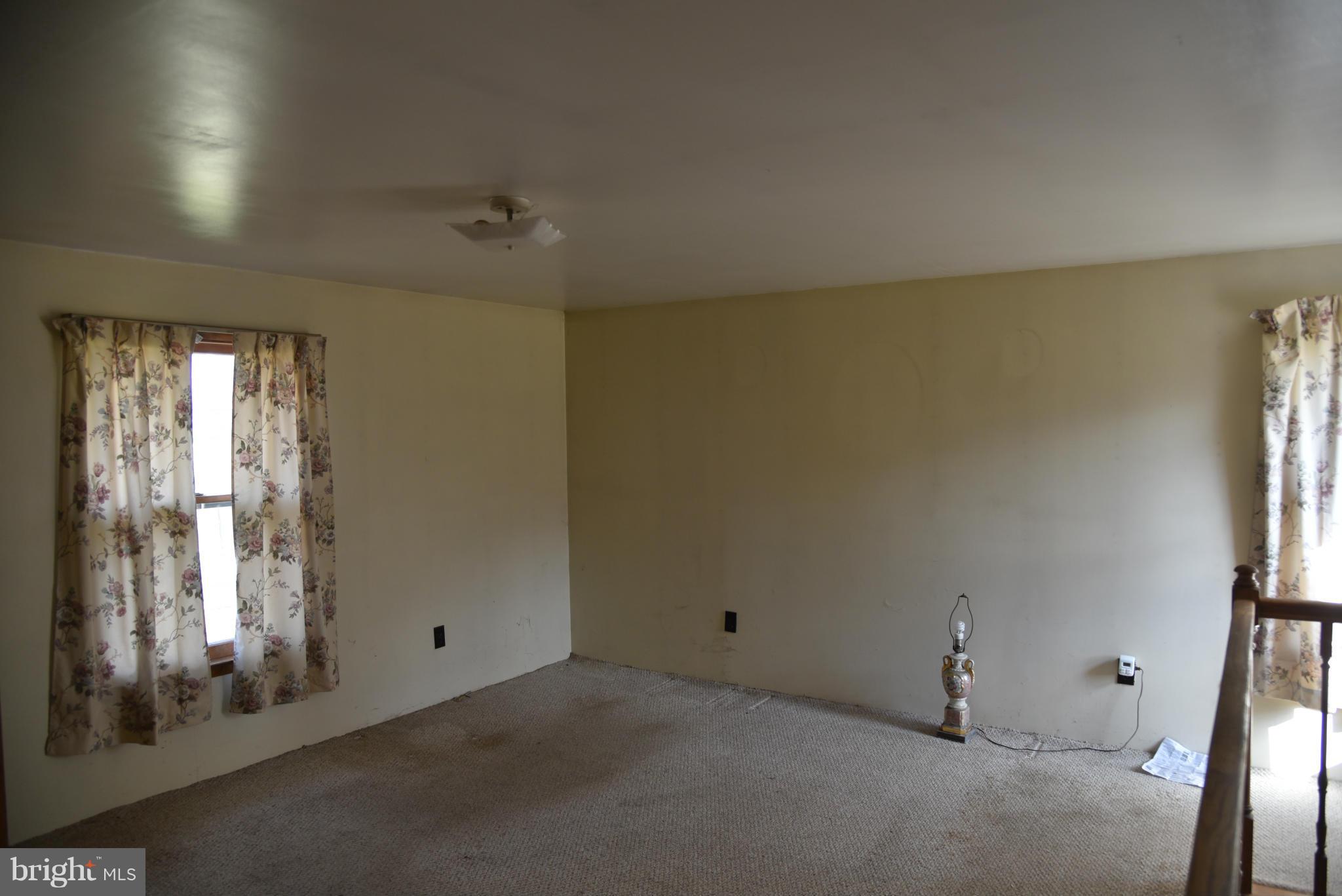3905 Salem Bottom Road Westminster, MD 21157 - Photo 19 of 26 an empty room with windows