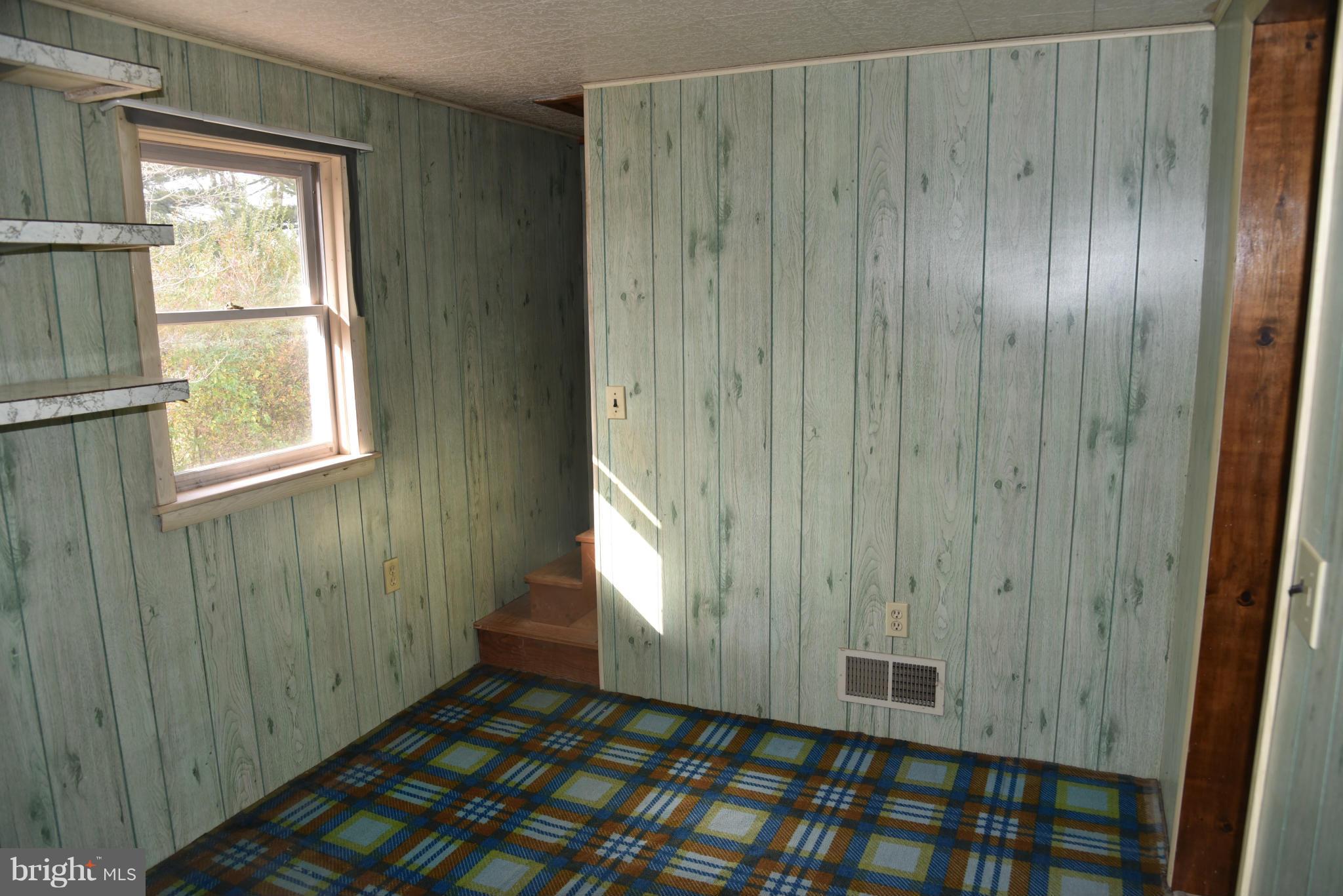 3905 Salem Bottom Road Westminster, MD 21157 - Photo 24 of 26 a view of an empty room with a window