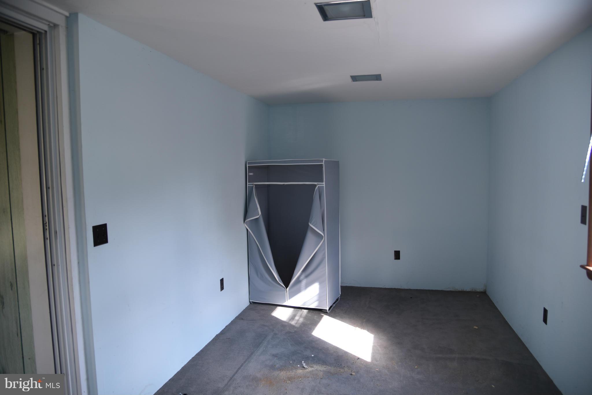 3905 Salem Bottom Road Westminster, MD 21157 - Photo 25 of 26 a view of a livingroom with wooden floor and a window