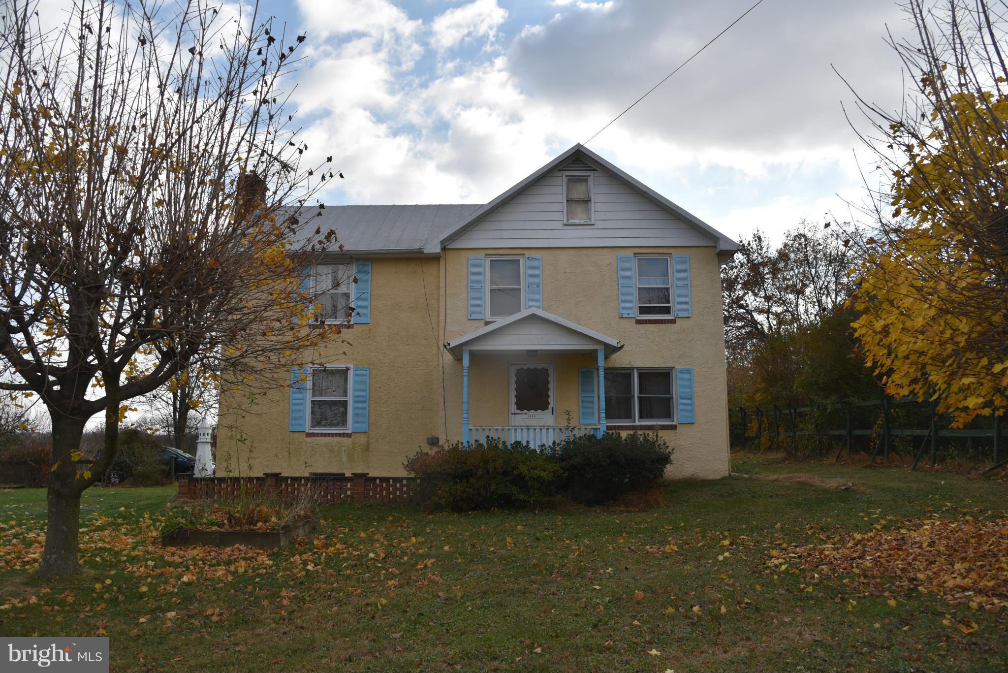 3905 Salem Bottom Road Westminster, MD 21157 - Photo 5 of 26 a front view of a house with a yard