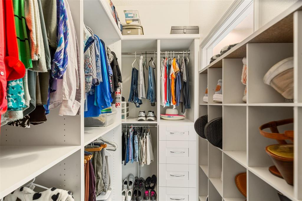 6206 Five Acre Road Plant City, FL 33565 - Photo 18 of 33 a view of walk in closet with clothes and shoes