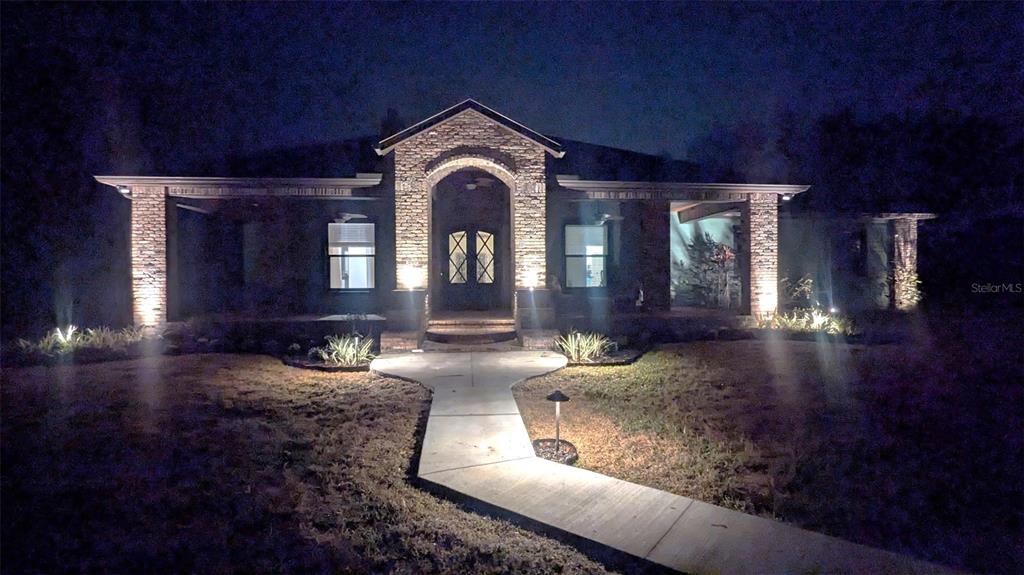 6206 Five Acre Road Plant City, FL 33565 - Photo 30 of 33 a living room with furniture and wooden floor