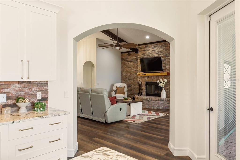 6206 Five Acre Road Plant City, FL 33565 - Photo 8 of 33 a living room with furniture and wooden floor