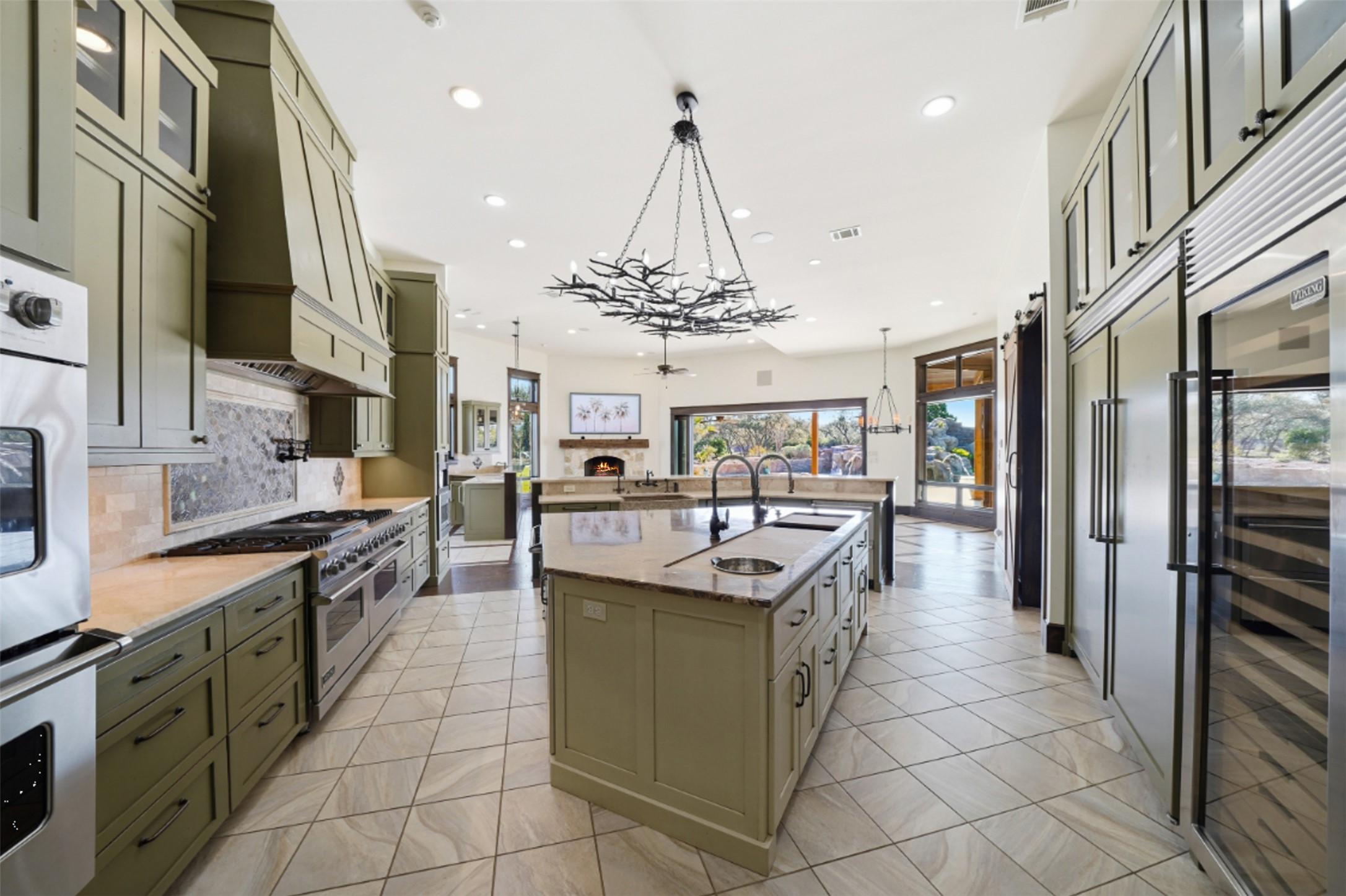 1580 Fm 3237 Wimberley, TX 78676 - Photo 24 of 40 a kitchen with stainless steel appliances granite countertop a sink and a stove