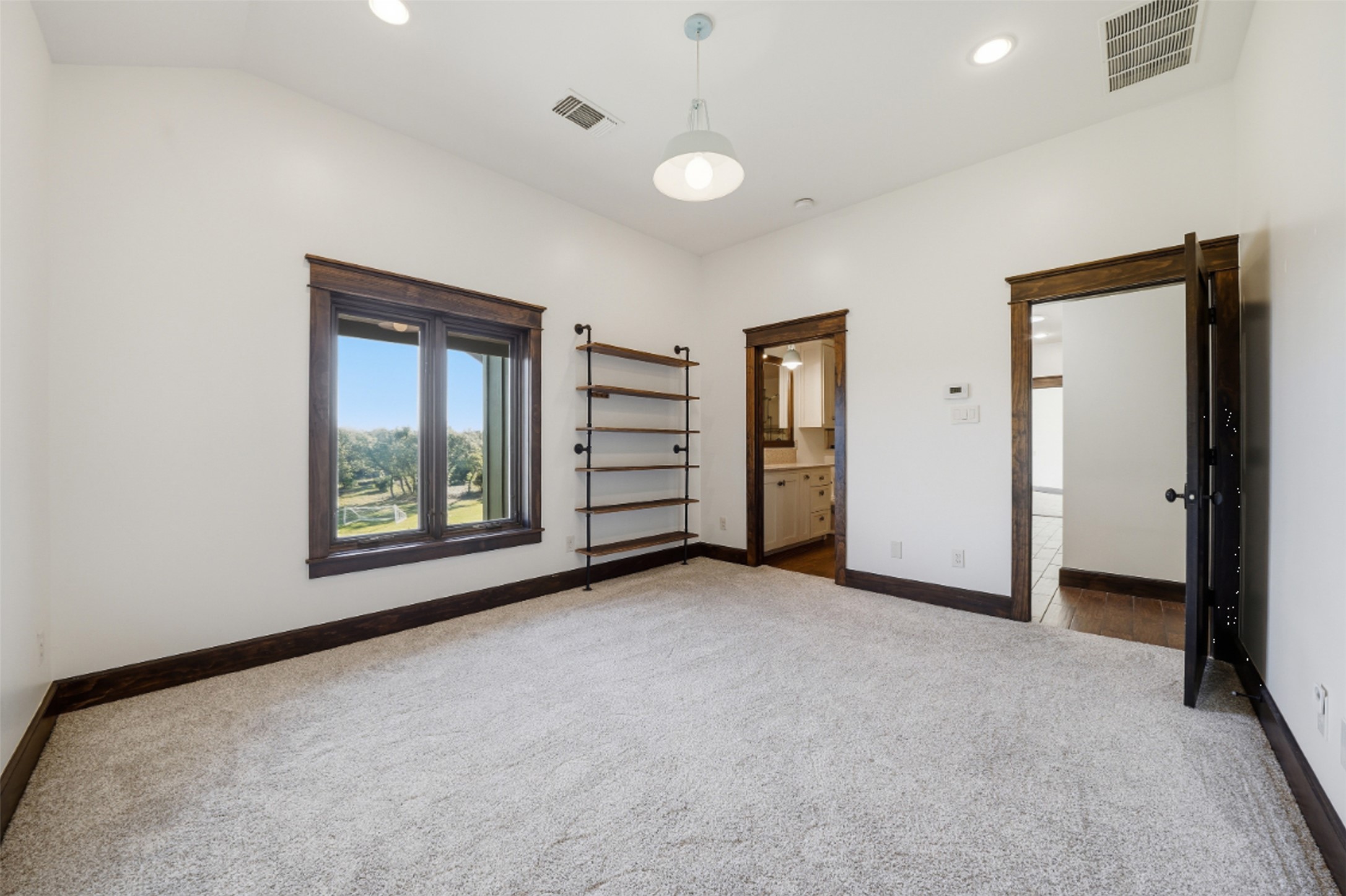 1580 Fm 3237 Wimberley, TX 78676 - Photo 27 of 40 an empty room with closet and windows