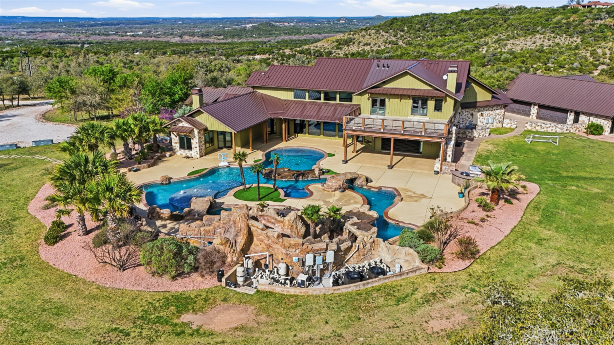 1580 Fm 3237 Wimberley, TX 78676 - Photo 3 of 40 an aerial view of a house with a yard basket ball court and outdoor seating