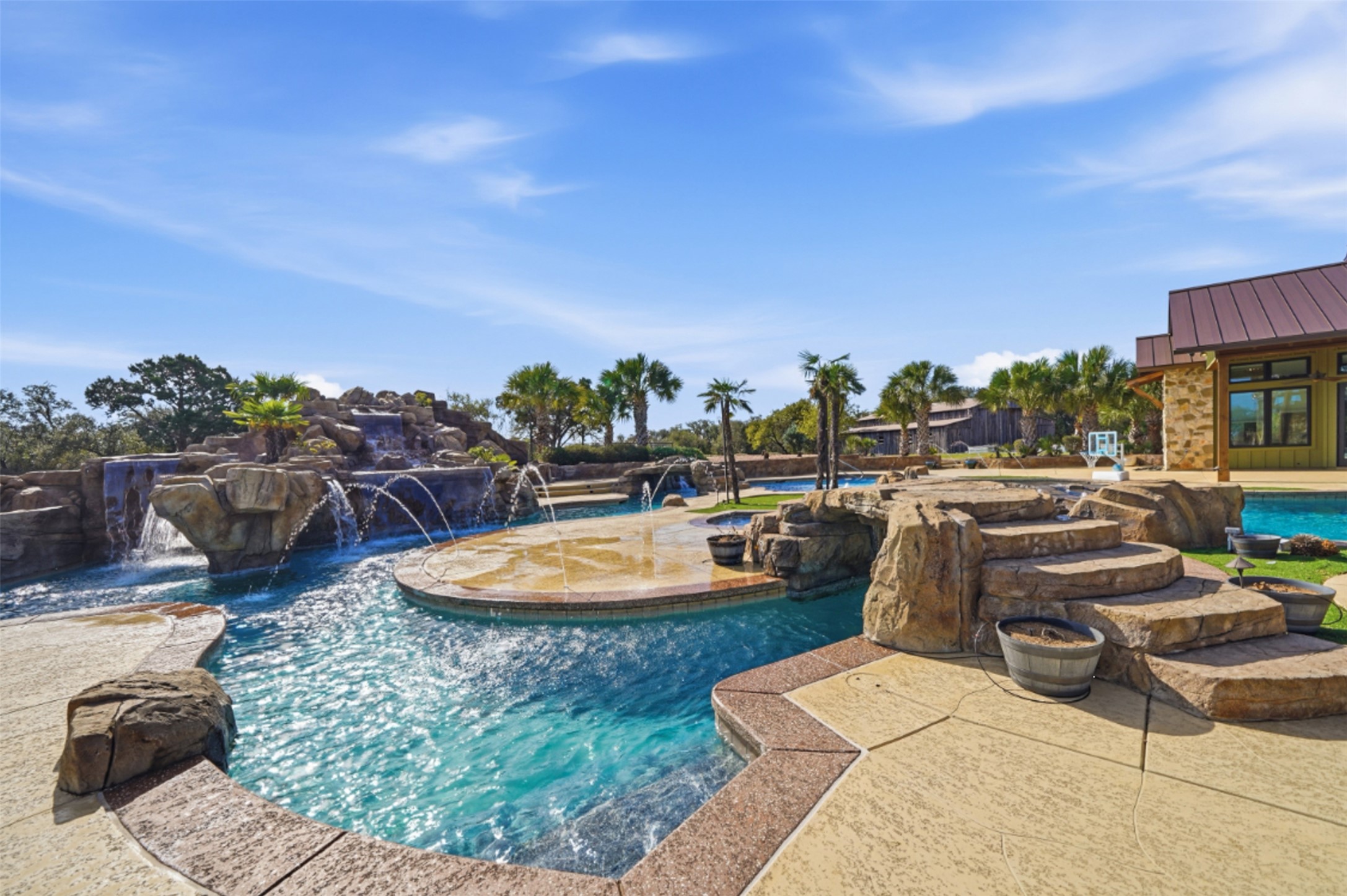 1580 Fm 3237 Wimberley, TX 78676 - Photo 33 of 40 a view of a swimming pool with lawn chairs