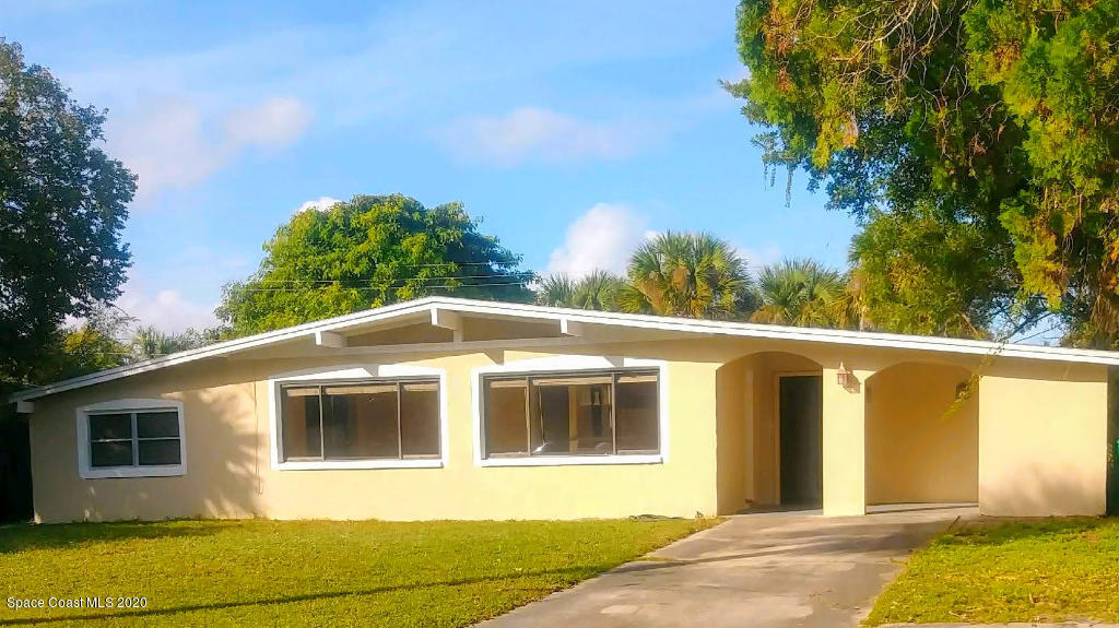 809 8th Street Merritt Island, FL 32953 - Photo 2 of 21 a view of a house with a backyard