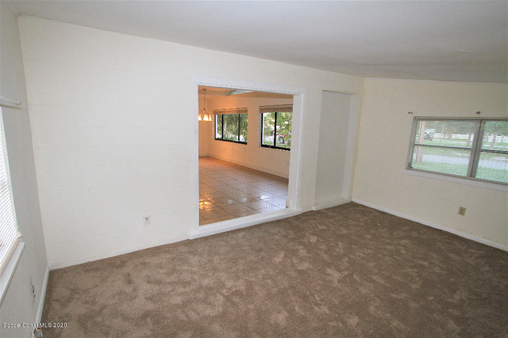 809 8th Street Merritt Island, FL 32953 - Photo 12 of 21 an empty room with windows
