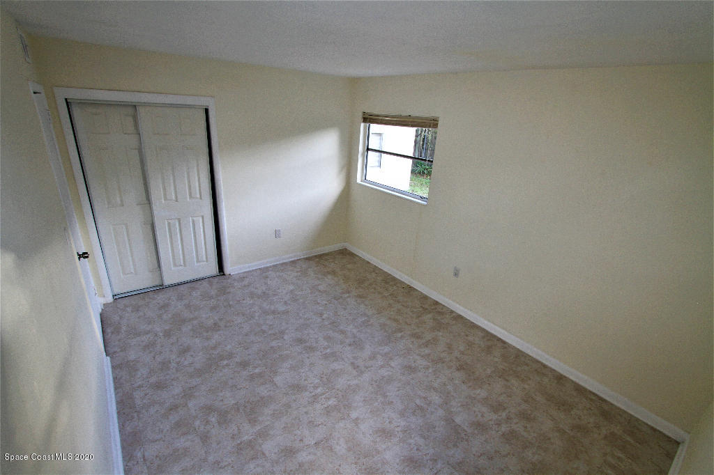 809 8th Street Merritt Island, FL 32953 - Photo 15 of 21 an empty room with windows