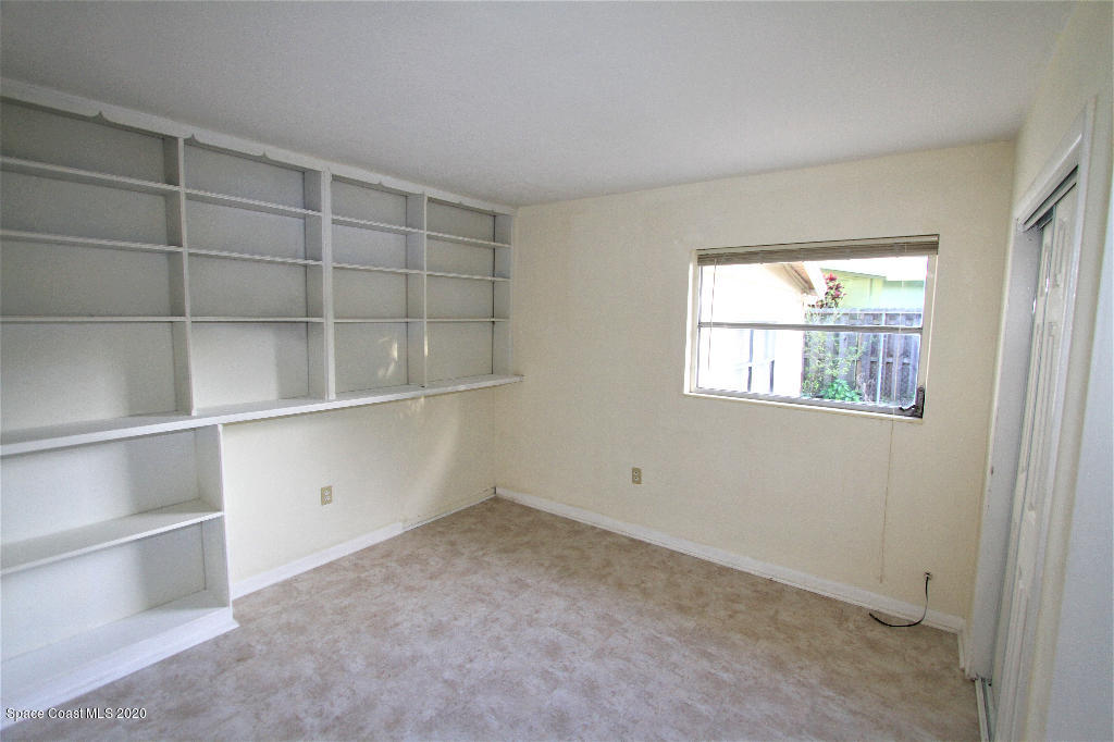 809 8th Street Merritt Island, FL 32953 - Photo 16 of 21 a view of an empty room with a window