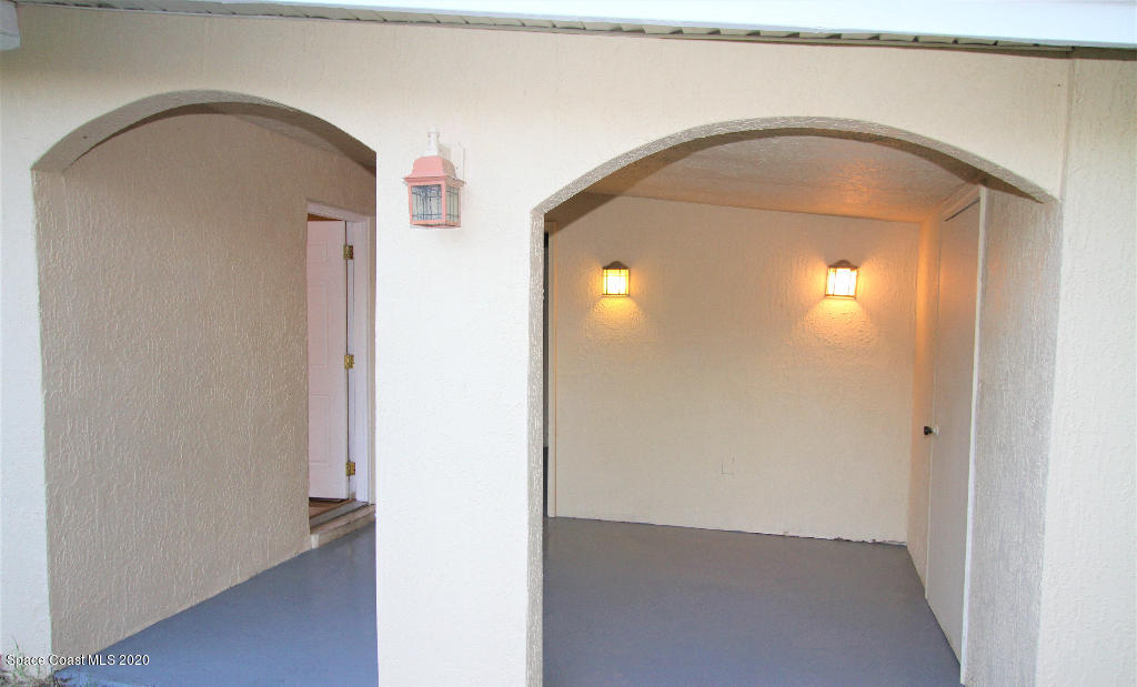 809 8th Street Merritt Island, FL 32953 - Photo 3 of 21 a view of livingroom with hallway