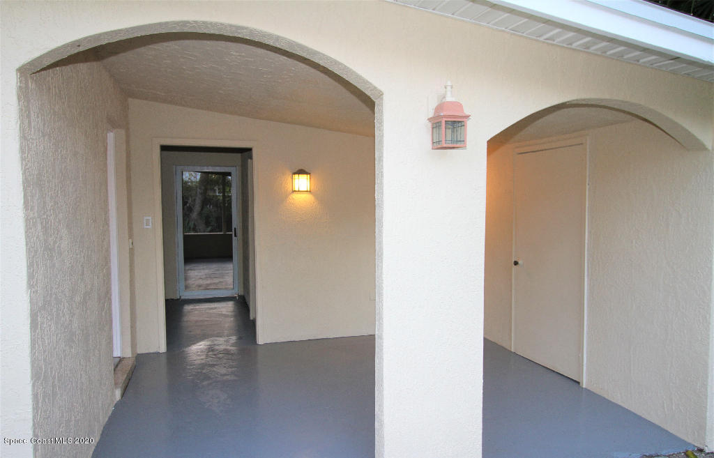 809 8th Street Merritt Island, FL 32953 - Photo 4 of 21 a view of an entryway with wooden floor