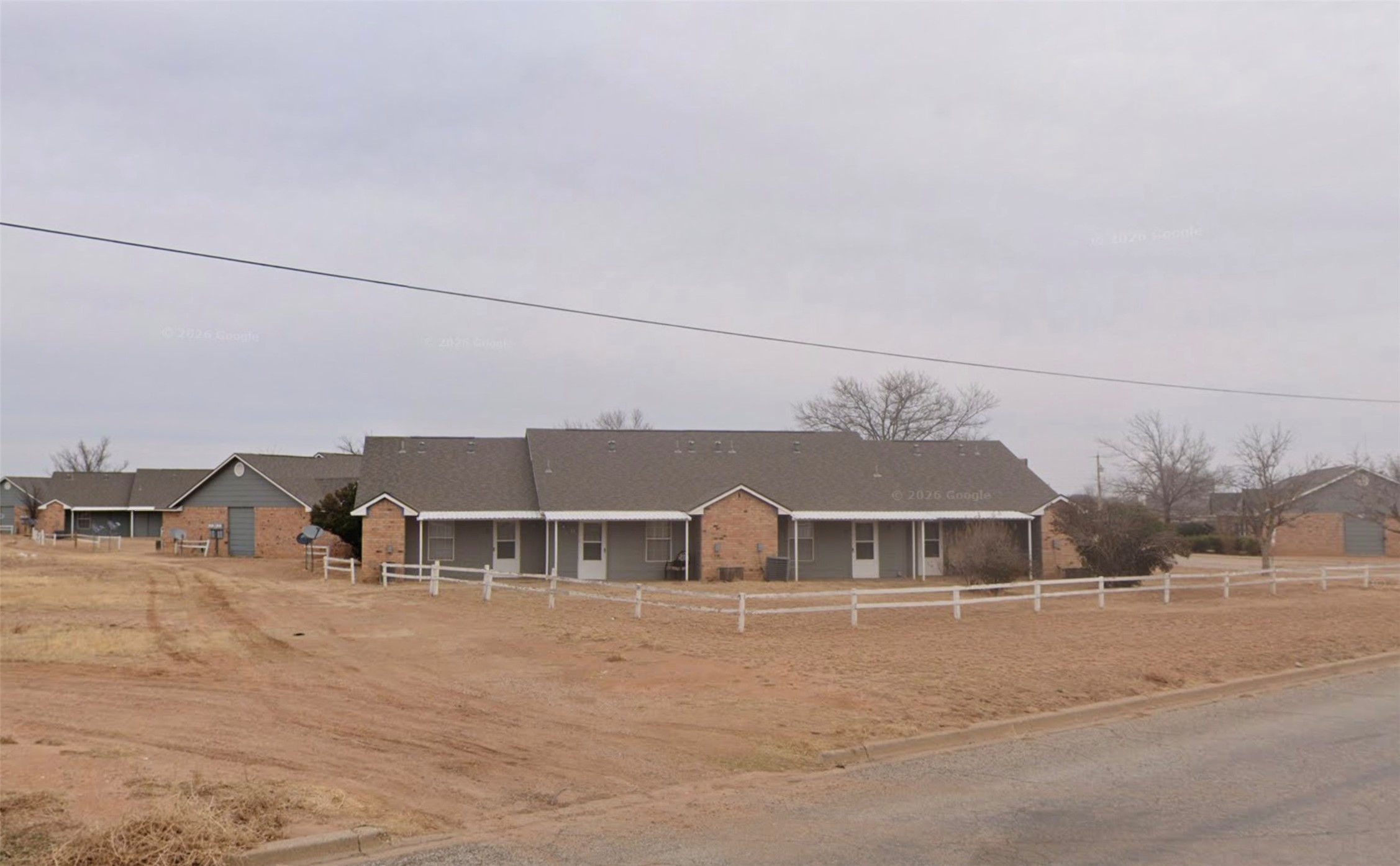 802 West 15th Street Post, TX 79356 - Photo 3 of 6 a view of houses and a street
