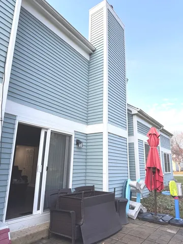 a view of a house with wooden door
