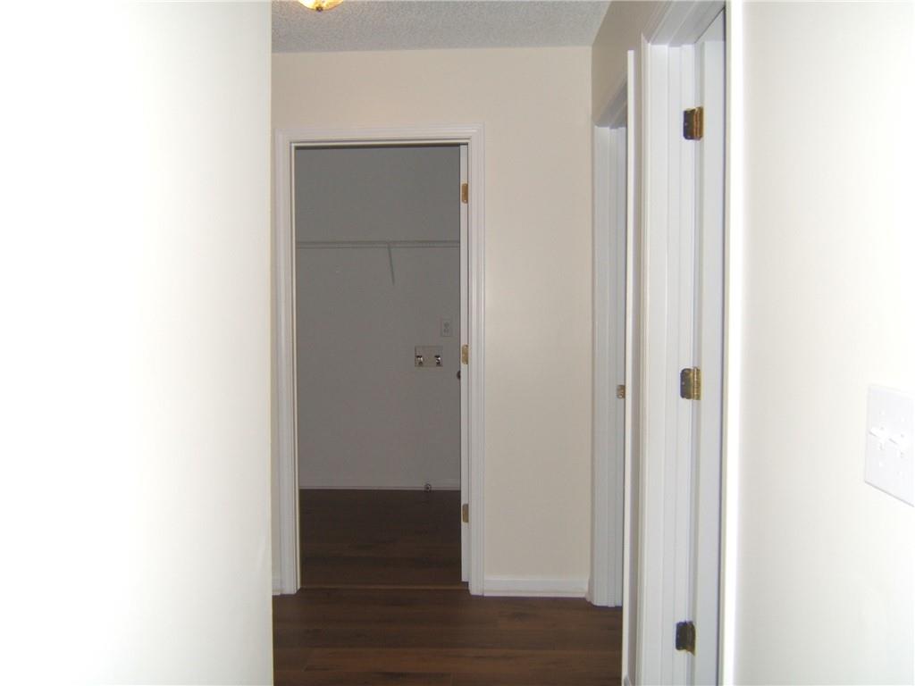 7202 Georges Way Morrow, GA 30260 - Photo 4 of 11 a view of a hallway with wooden floor
