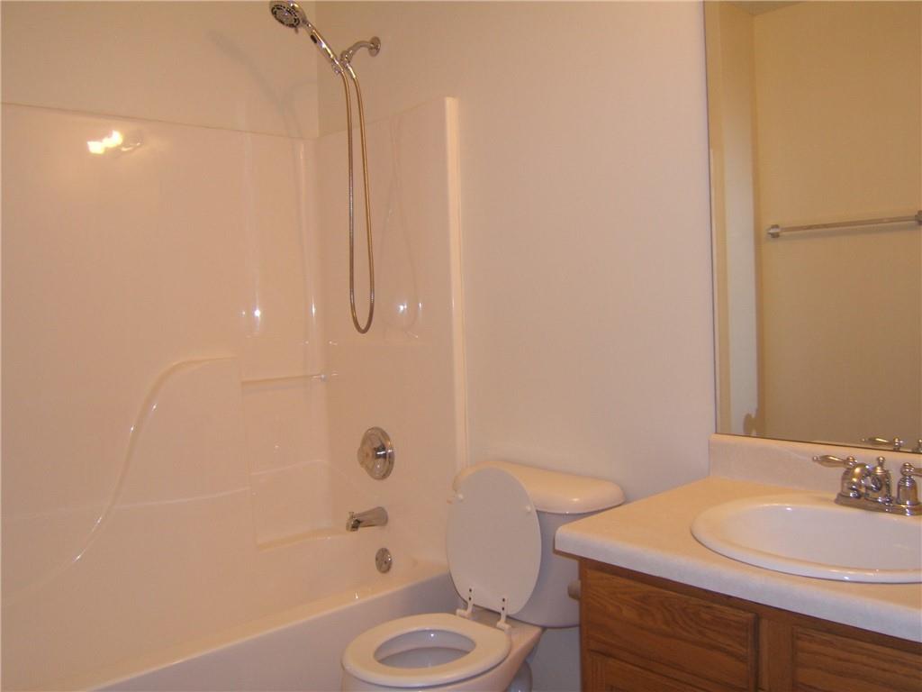 7202 Georges Way Morrow, GA 30260 - Photo 5 of 11 a bathroom with a sink a toilet and shower