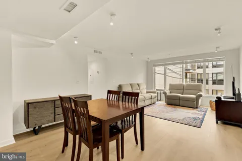 a view of a dining room with furniture