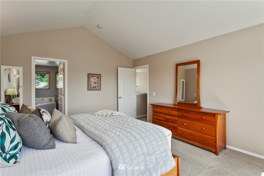 913 232nd Street Southwest Bothell, WA 98021 - Photo 22 of 34 a bedroom with a bed and a dresser