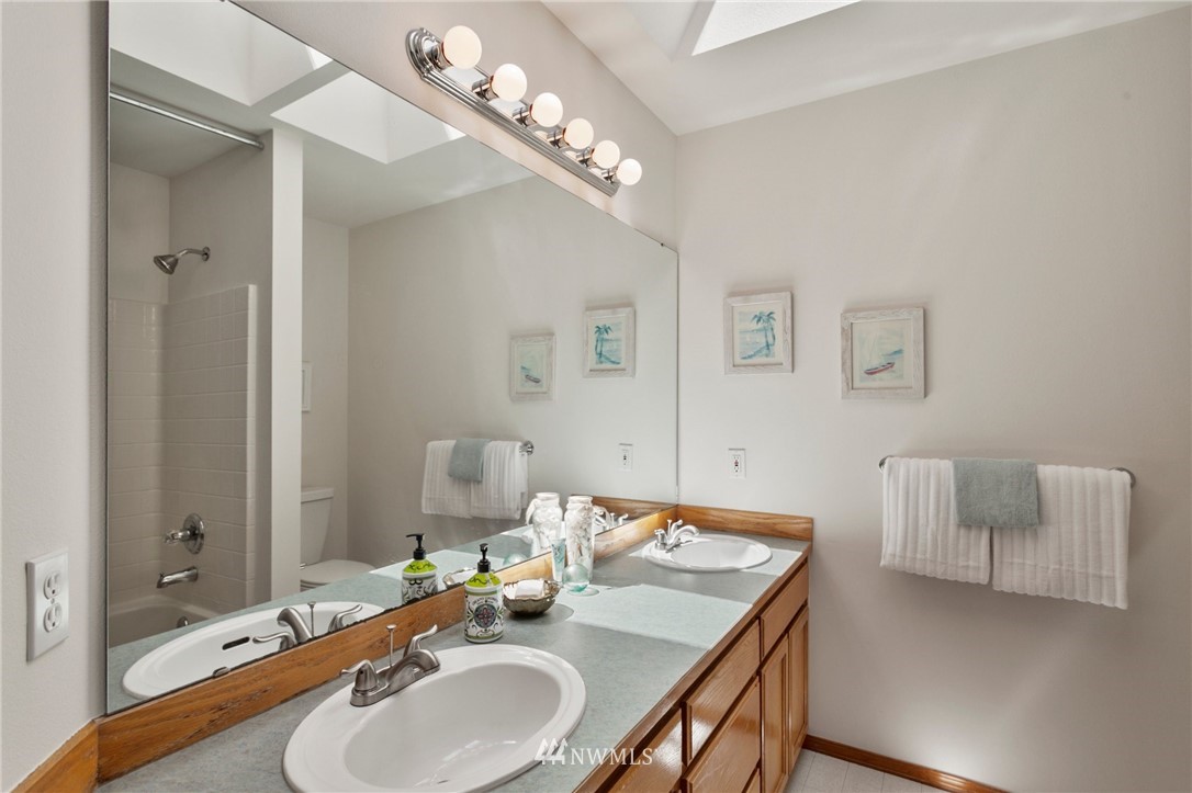 913 232nd Street Southwest Bothell, WA 98021 - Photo 29 of 34 a bathroom with a sink and a mirror