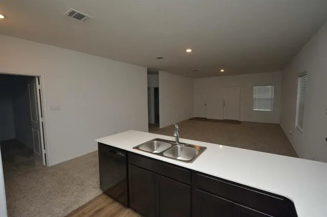 a utility room with washer and dryer