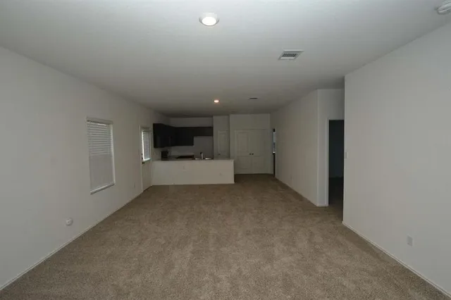a view of a big room with closet and cabinet