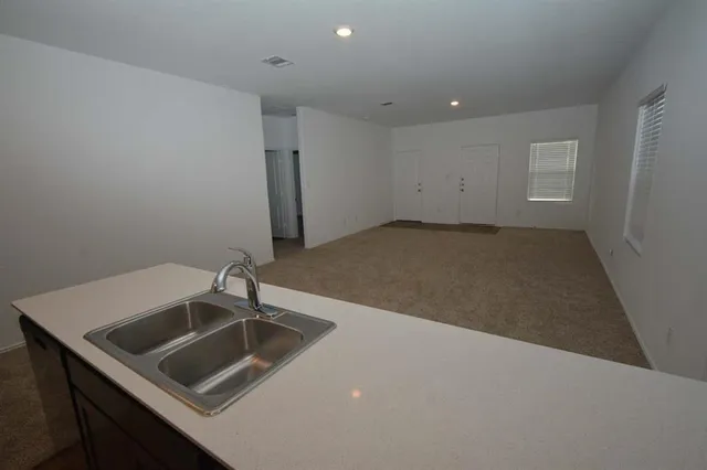 a view of a lake in middle of the house