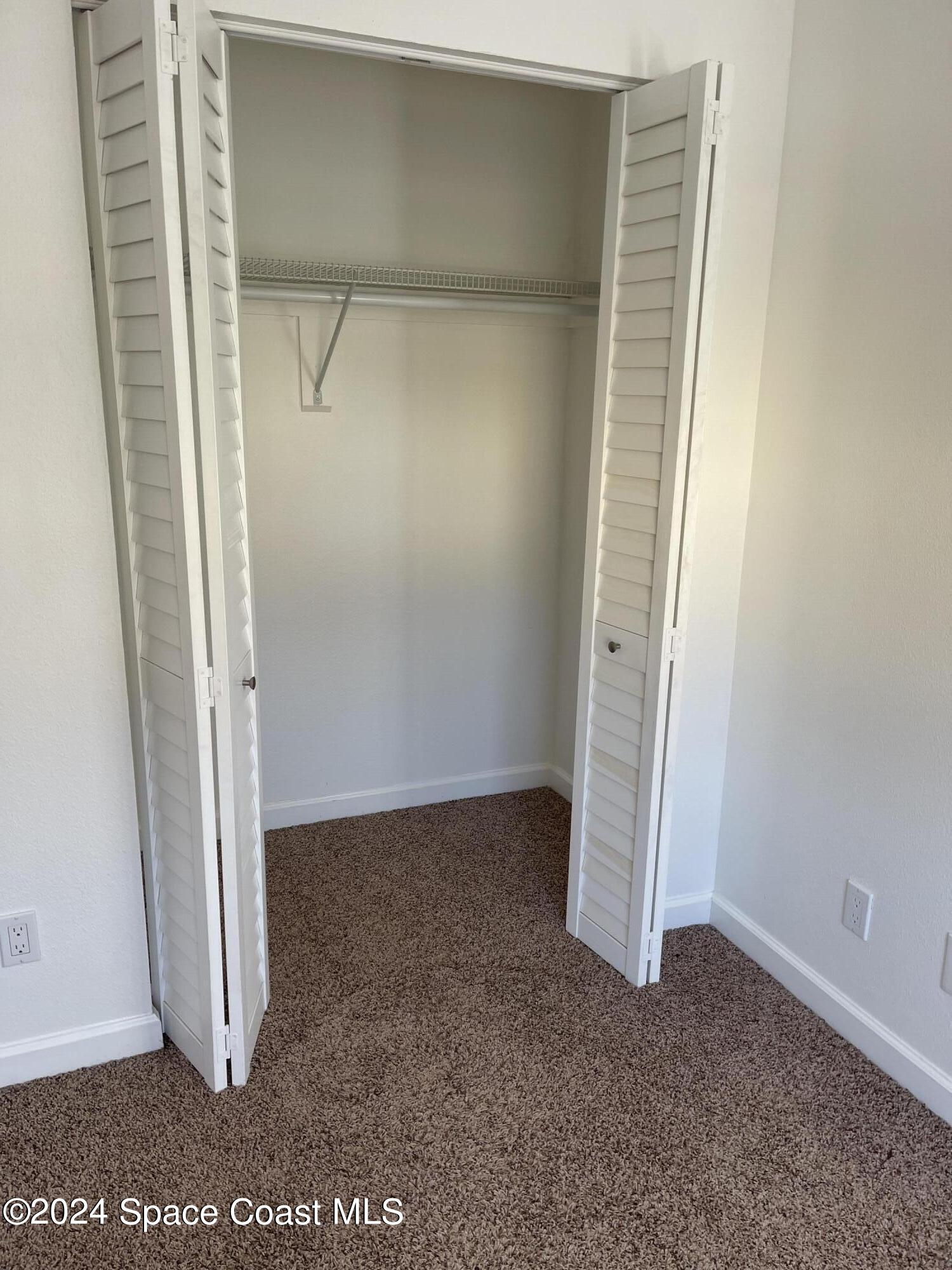 598 North Wickham Road, Unit 36 Melbourne, FL 32935 - Photo 16 of 21 MASTER BEDROOM CLOSET