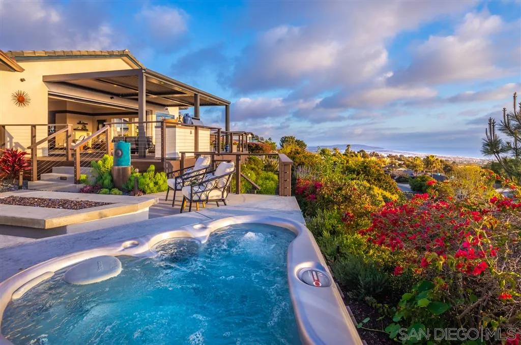 5630 Soledad Road La Jolla, CA 92037 - Photo 19 of 25 a view of a patio with a table and chairs