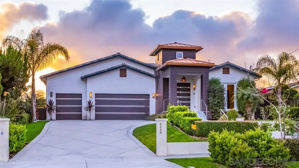 5630 Soledad Road La Jolla, CA 92037 - Photo 2 of 25 a front view of a house with garden