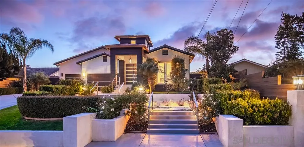 5630 Soledad Road La Jolla, CA 92037 - Photo 22 of 25 a front view of a house with a yard