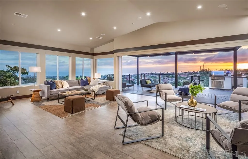 5630 Soledad Road La Jolla, CA 92037 - Photo 3 of 25 a living room with furniture and a large window