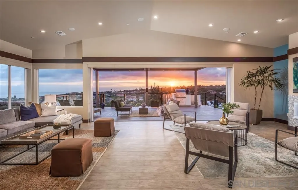 5630 Soledad Road La Jolla, CA 92037 - Photo 4 of 25 a living room with furniture and a large window