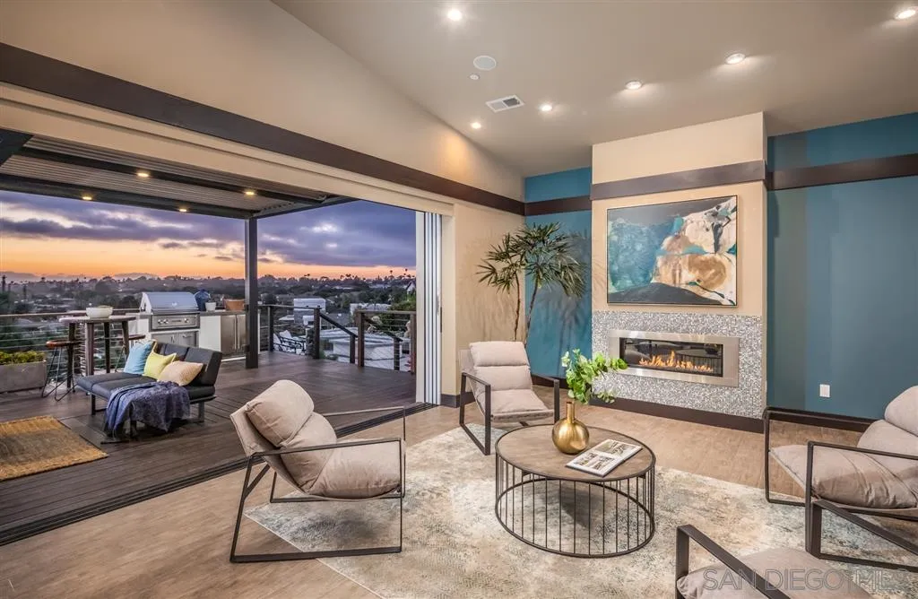 5630 Soledad Road La Jolla, CA 92037 - Photo 6 of 25 a living room with furniture and a large window